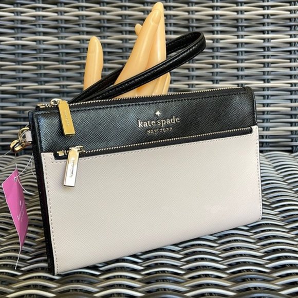 kate spade Handbags - Kate Spade Staci Medium Wristlet Warm Beige